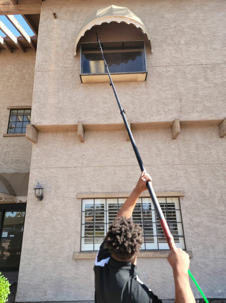 Image of Ace Window Cleaning Professional getting windows cleaned.